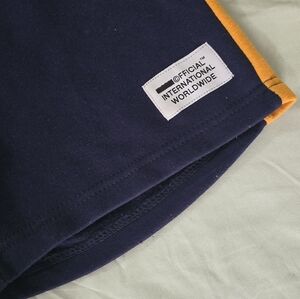 Official International Navy and Orange Shorts